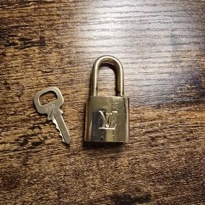 Louis Vuitton Gold Padlock with Key